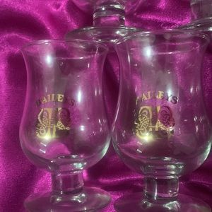 5 baileys glasses. 3-4 oz glass. Like new. Gold writing